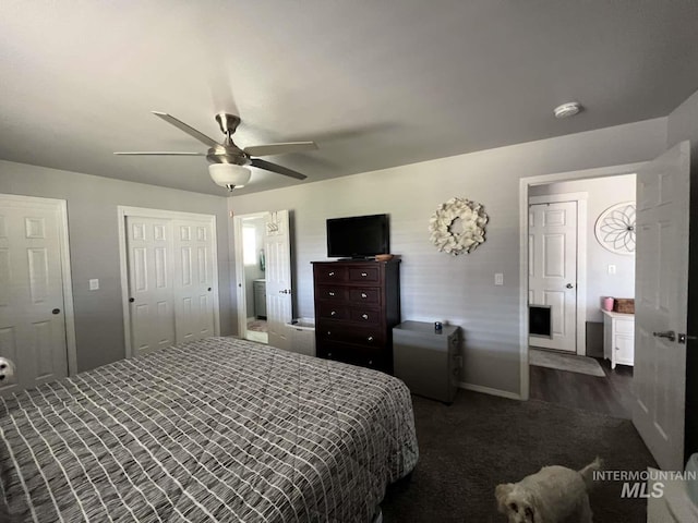 bedroom with a ceiling fan and dark colored carpet