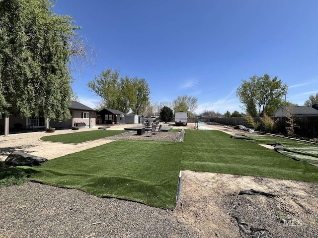 view of yard with fence