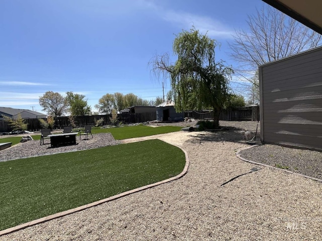 view of yard featuring a fenced backyard