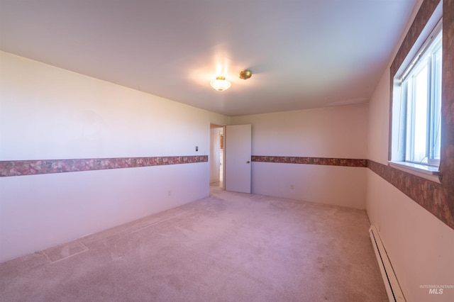 50 S 200 W, Jerome, ID 83338 - unfurnished room with light carpet and a baseboard radiator