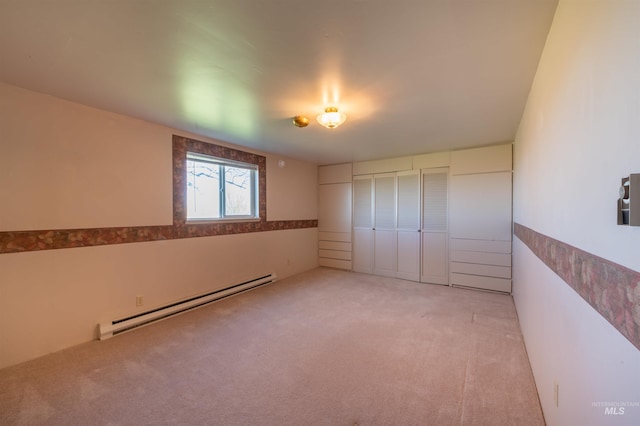50 S 200 W, Jerome, ID 83338 - unfurnished bedroom with a baseboard radiator, a closet, and carpet floors