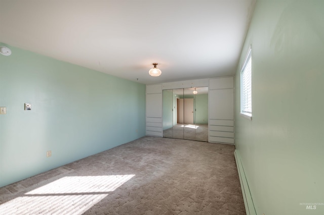 50 S 200 W, Jerome, ID 83338 - unfurnished bedroom with a baseboard radiator, carpet flooring, and a closet