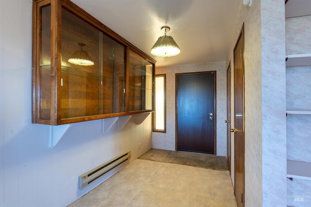 50 S 200 W, Jerome, ID 83338 - entryway with carpet floors and a baseboard radiator