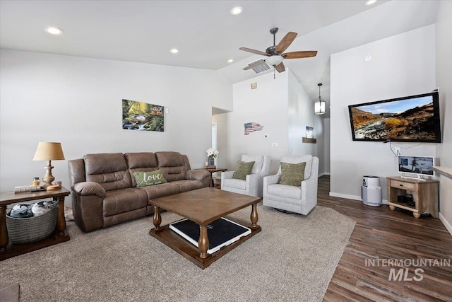 living area with recessed lighting, visible vents, wood finished floors, and ceiling fan