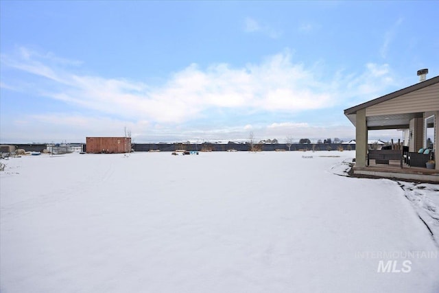 view of snowy yard