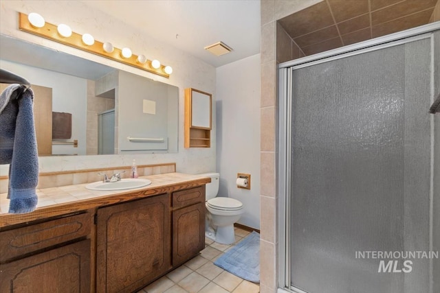 full bath featuring tile patterned flooring, visible vents, toilet, a stall shower, and vanity