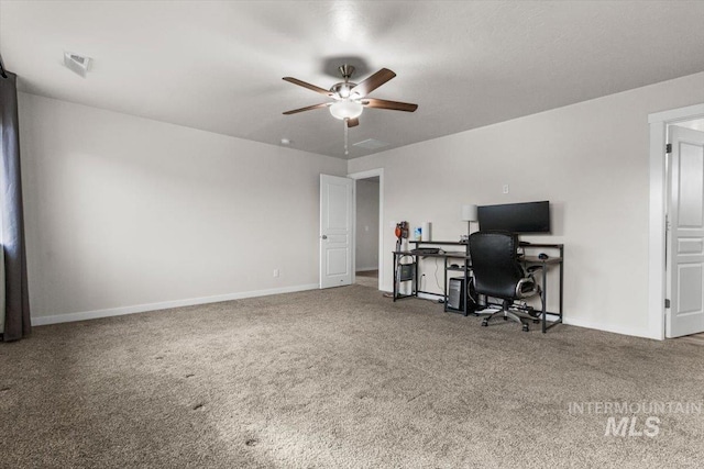 office space with carpet and ceiling fan