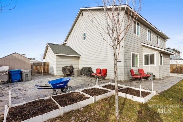 rear view of house with a patio area