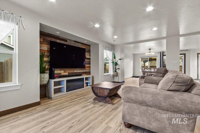 living room with light hardwood / wood-style floors