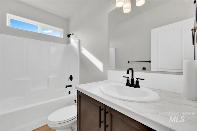 full bathroom featuring backsplash, vanity, shower / bathtub combination, and toilet