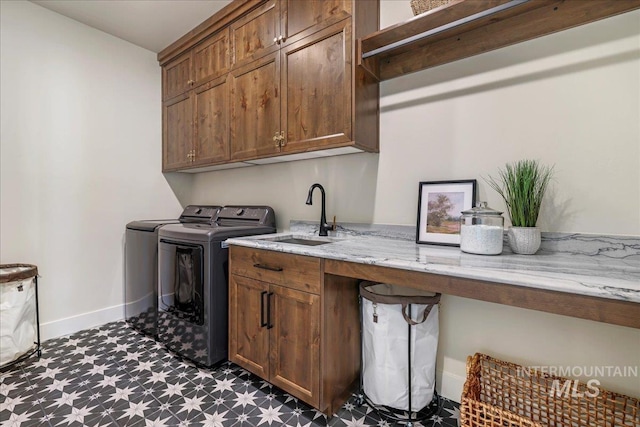 3160 Crescent Moon Rd, Twin Falls, ID 83301 - laundry room featuring dark flooring, cabinet space, washer and clothes dryer, and an office area