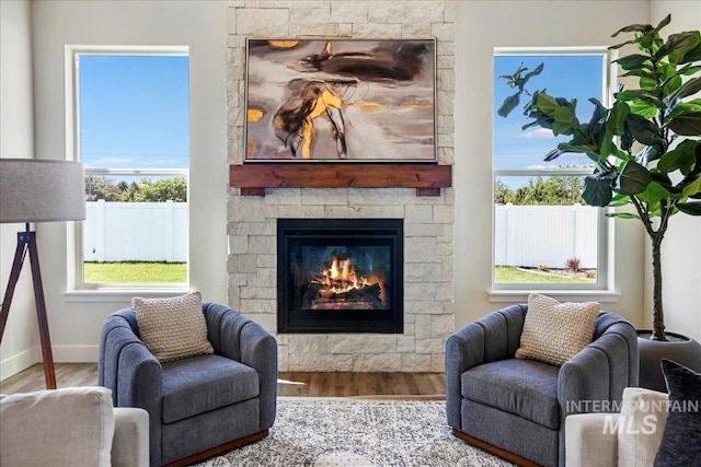 3160 Crescent Moon Rd, Twin Falls, ID 83301 - living room with wood finished floors and a fireplace