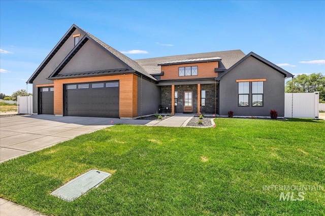 3160 Crescent Moon Rd, Twin Falls, ID 83301 - view of front of property featuring a standing seam roof, driveway, a garage, and a metal roof