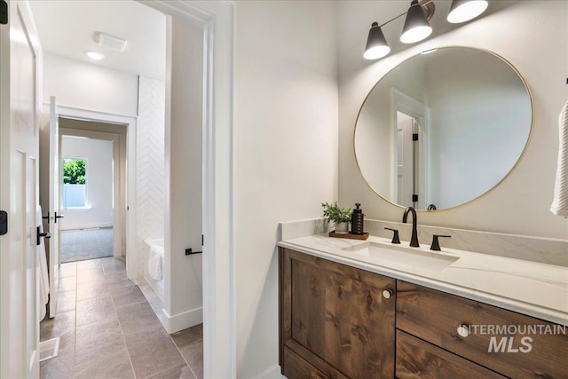 3160 Crescent Moon Rd, Twin Falls, ID 83301 - bathroom with vanity, a bath, and tile patterned floors