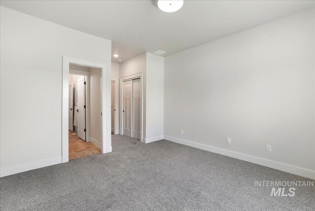 3160 Crescent Moon Rd, Twin Falls, ID 83301 - unfurnished bedroom with carpet flooring, recessed lighting, and a closet