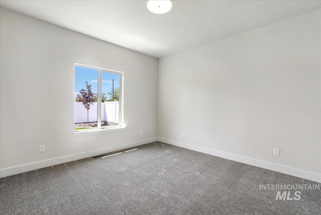 3160 Crescent Moon Rd, Twin Falls, ID 83301 - spare room featuring carpet flooring and baseboards
