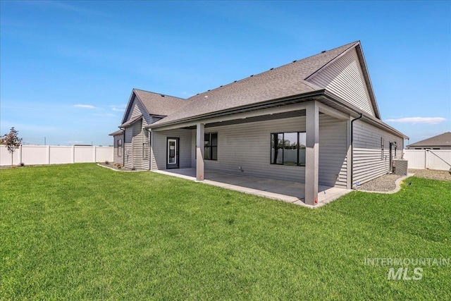 3160 Crescent Moon Rd, Twin Falls, ID 83301 - rear view of property featuring a patio area, a fenced backyard, and roof with shingles