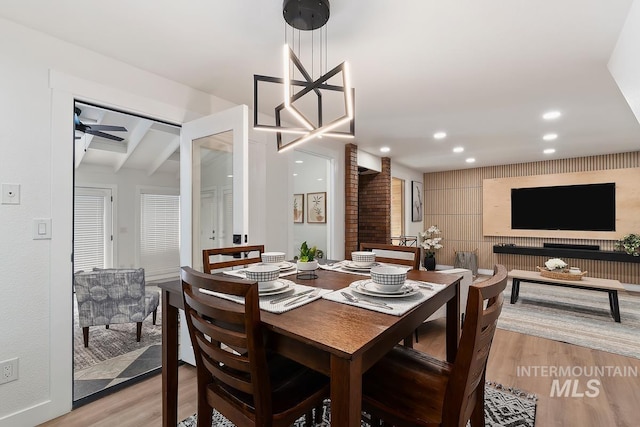 7913 W War Bonnet Dr, Boise, ID 83709 - dining room with light wood-style flooring, ceiling fan, and recessed lighting