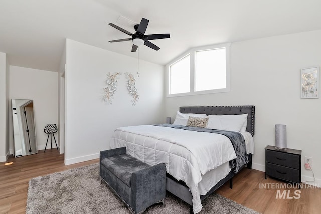7913 W War Bonnet Dr, Boise, ID 83709 - bedroom with wood finished floors, baseboards, and ceiling fan