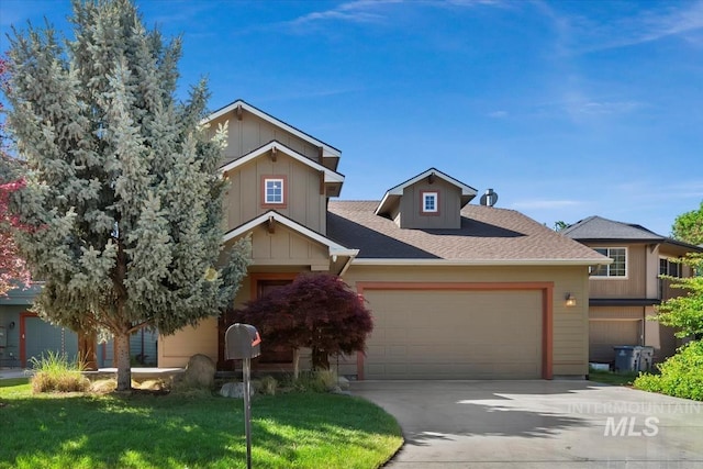 187 E Wishbone Ct, Boise, ID 83706 - view of front of house with an attached garage, driveway, and roof with shingles