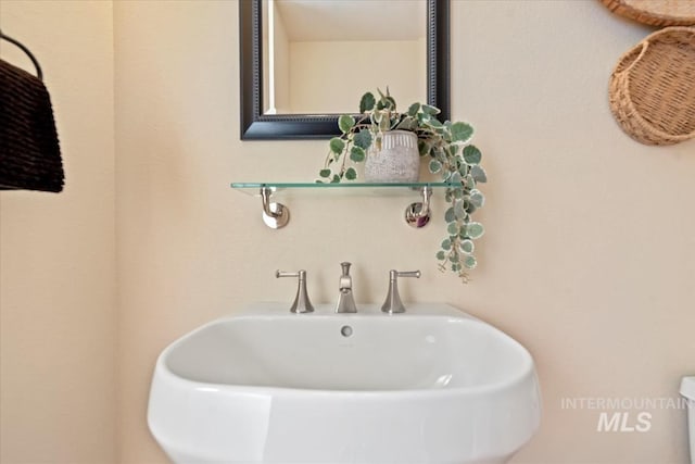 187 E Wishbone Ct, Boise, ID 83706 - half bathroom featuring a sink