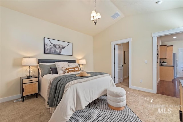 187 E Wishbone Ct, Boise, ID 83706 - bedroom featuring light carpet, vaulted ceiling, baseboards, and a chandelier