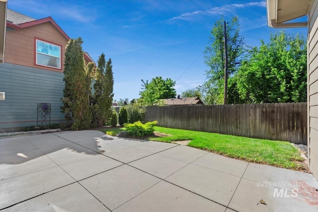 187 E Wishbone Ct, Boise, ID 83706 - fenced backyard featuring a patio area
