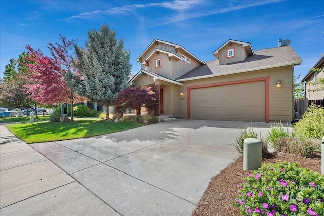 187 E Wishbone Ct, Boise, ID 83706 - traditional-style home featuring concrete driveway, a front yard, an attached garage, and board and batten siding