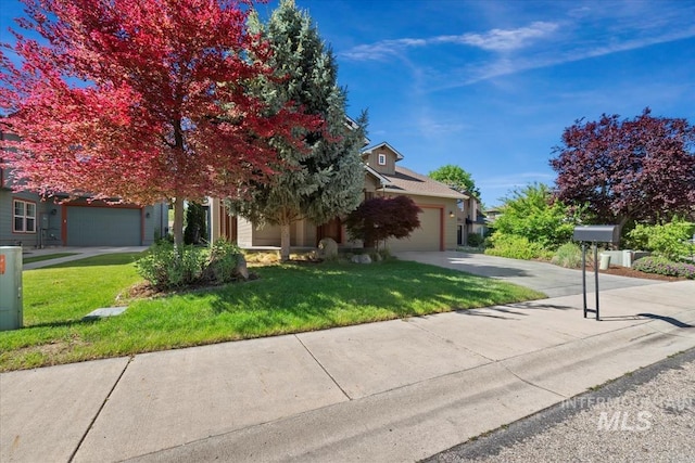 187 E Wishbone Ct, Boise, ID 83706 - obstructed view of property featuring driveway, a garage, and a front yard