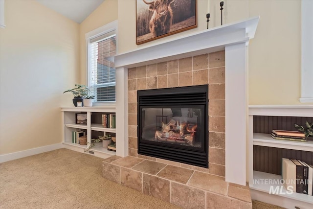 187 E Wishbone Ct, Boise, ID 83706 - detailed view of a fireplace, carpet floors, and baseboards
