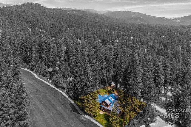 14 Sunrise Dr, Garden Valley, ID 83622 - drone / aerial view featuring a wooded view and a mountain view