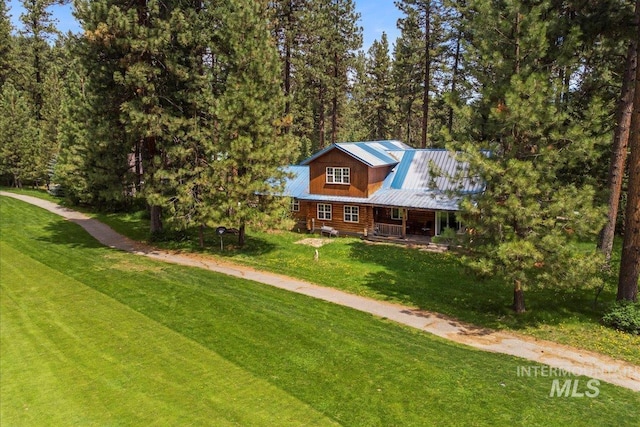 14 Sunrise Dr, Garden Valley, ID 83622 - log cabin with a front lawn, covered porch, and metal roof