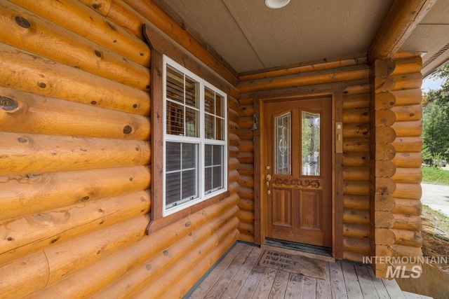 14 Sunrise Dr, Garden Valley, ID 83622 - doorway to property featuring log siding