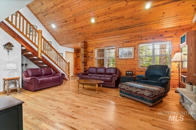 14 Sunrise Dr, Garden Valley, ID 83622 - living room with stairs, high vaulted ceiling, and wood finished floors
