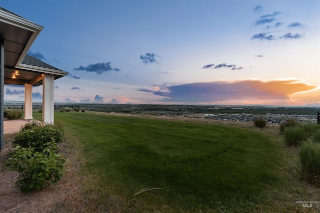 5557 E Hootowl Dr, Boise, ID 83716 - yard at dusk with a yard and a view of countryside