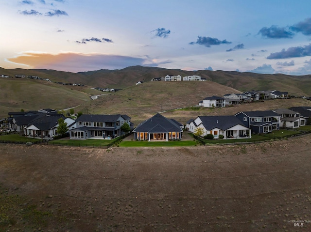 5557 E Hootowl Dr, Boise, ID 83716 - aerial perspective of suburban area with mountains