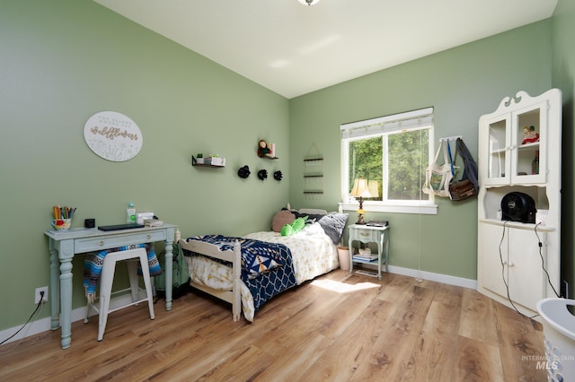 6524 S Derbyshire Ave, Boise, ID 83709 - bedroom featuring light wood-style flooring and baseboards