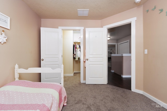 6524 S Derbyshire Ave, Boise, ID 83709 - bedroom with carpet floors, a spacious closet, baseboards, and a closet