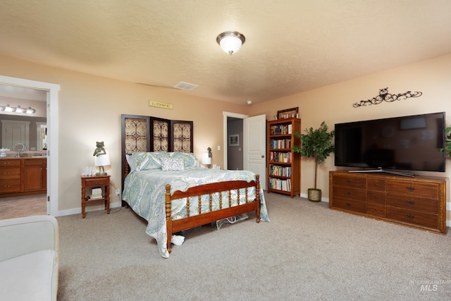 6524 S Derbyshire Ave, Boise, ID 83709 - bedroom with light colored carpet, baseboards, and ensuite bath