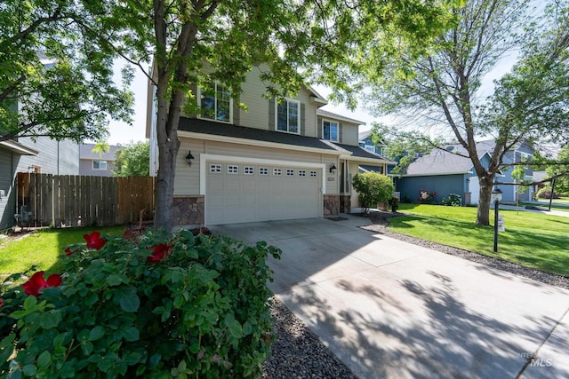 6524 S Derbyshire Ave, Boise, ID 83709 - traditional-style home with driveway, an attached garage, and stone siding