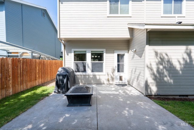 6524 S Derbyshire Ave, Boise, ID 83709 - view of patio with a fire pit and a grill
