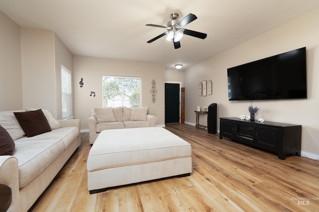 6524 S Derbyshire Ave, Boise, ID 83709 - living room with light wood finished floors, ceiling fan, and baseboards