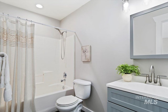 full bathroom featuring vanity, toilet, and shower / bath combo