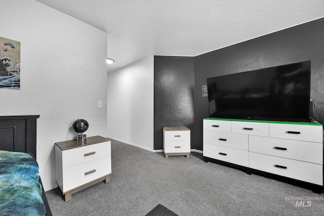 carpeted bedroom with baseboards