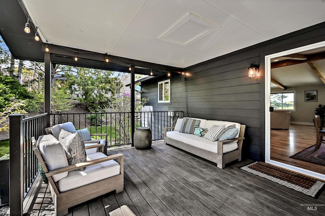 deck featuring outdoor lounge area