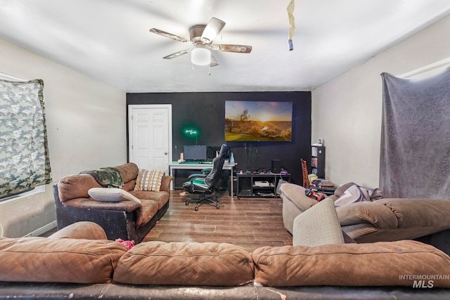 living room with ceiling fan and hardwood / wood-style flooring