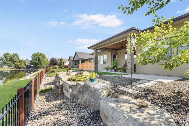 view of yard featuring a patio area and fence