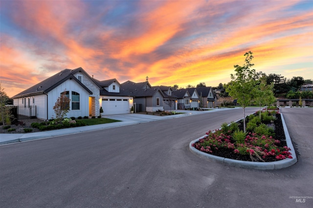 view of street with a residential view and curbs