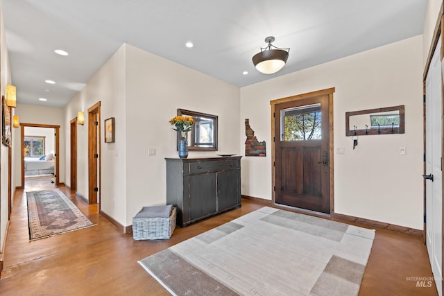 entrance foyer with concrete flooring