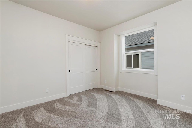 view of carpeted spare room